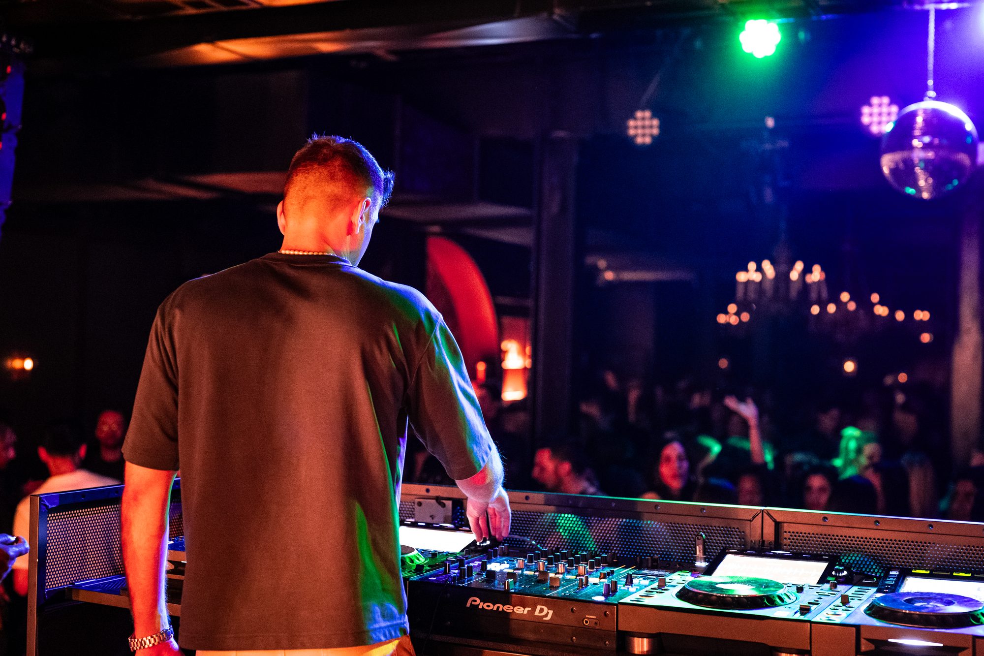 Adrian G behind Pioneer decks